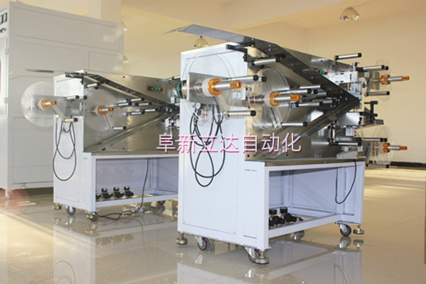 氣動控制張力卷繞機用于啟動電容器的生產(chǎn)中。